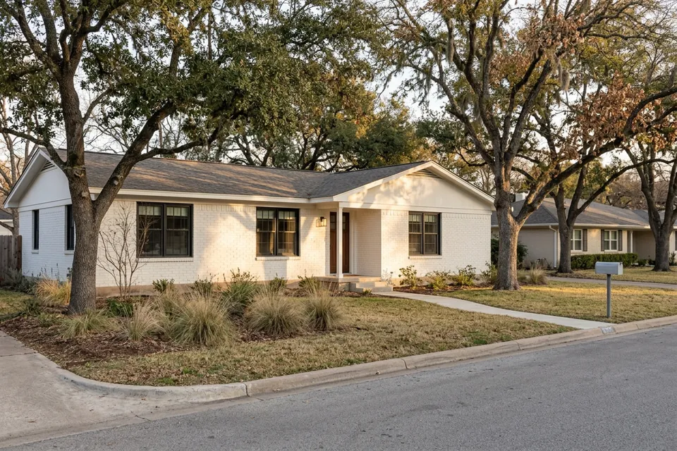 Illustration of a 1970s white-painted brick ranch house