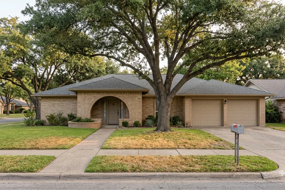 Illustration of a 1980s tan brick house with an arched entry