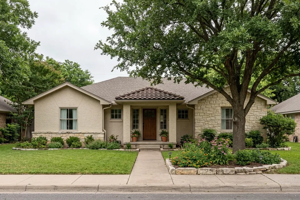 Illustration of a 1990s stucco and stone house