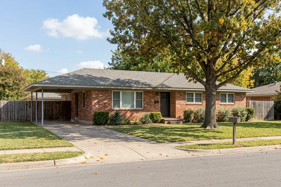 Illustration of a 1960s red brick ranch house with a carport