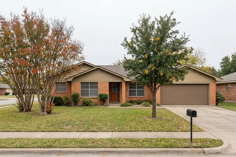 Illustration of a 1970s brick ranch house with a two-car garage