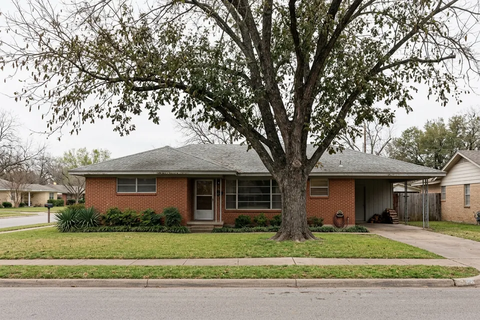 Illustration of a 1960s red brick ranch house with a carport