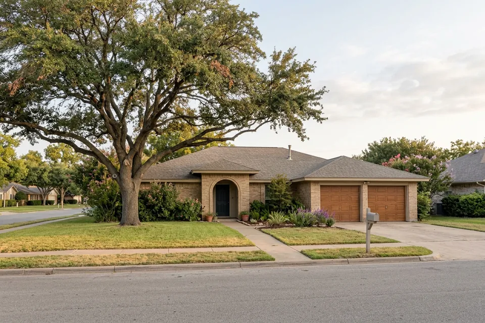 Illustration of a 1980s tan brick house with an arched entry