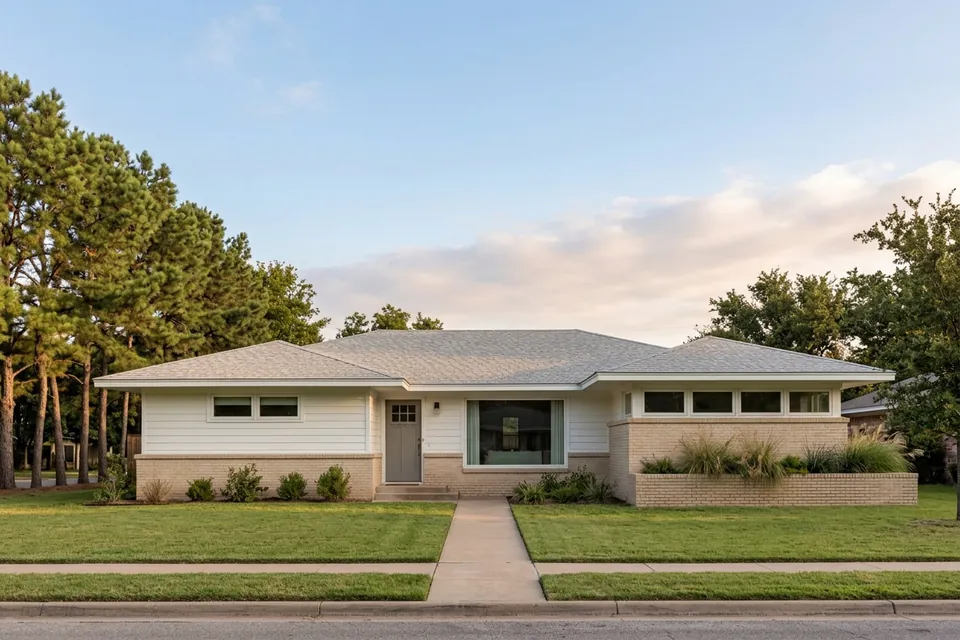 Illustration of a 1960s white wood ranch house