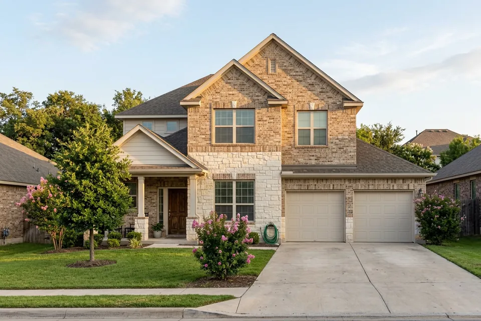 Illustration of a two-story stone and brick suburban house