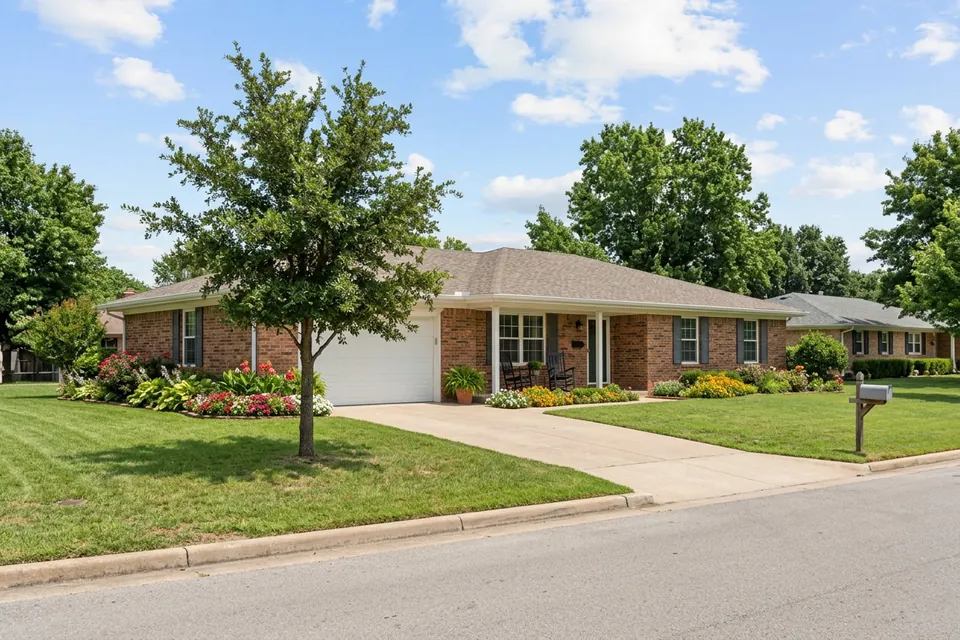 Illustration of a 1970s brick ranch house with shutters
