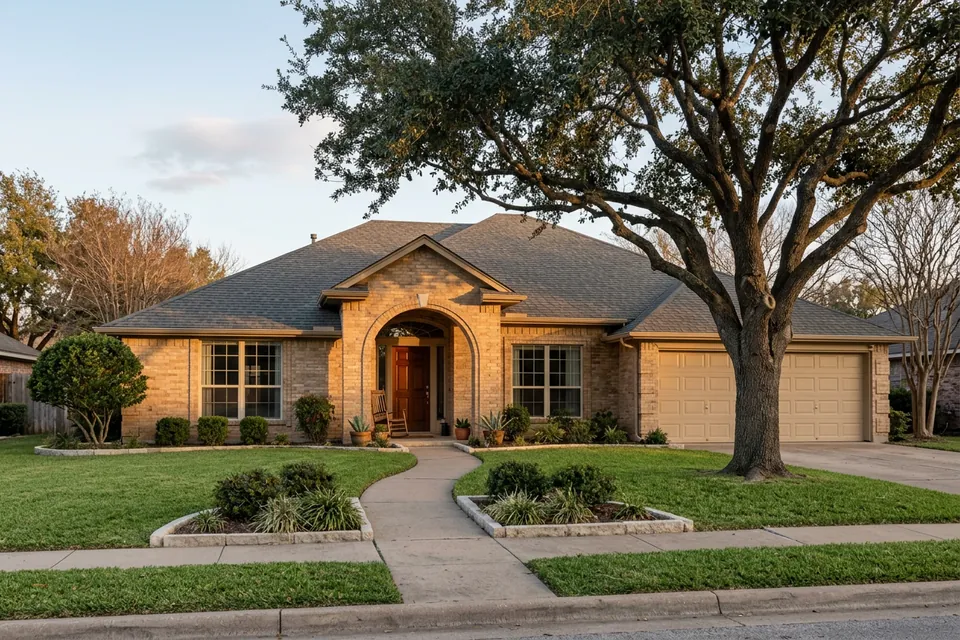 Illustration of a 1980s tan brick house with an arched entry